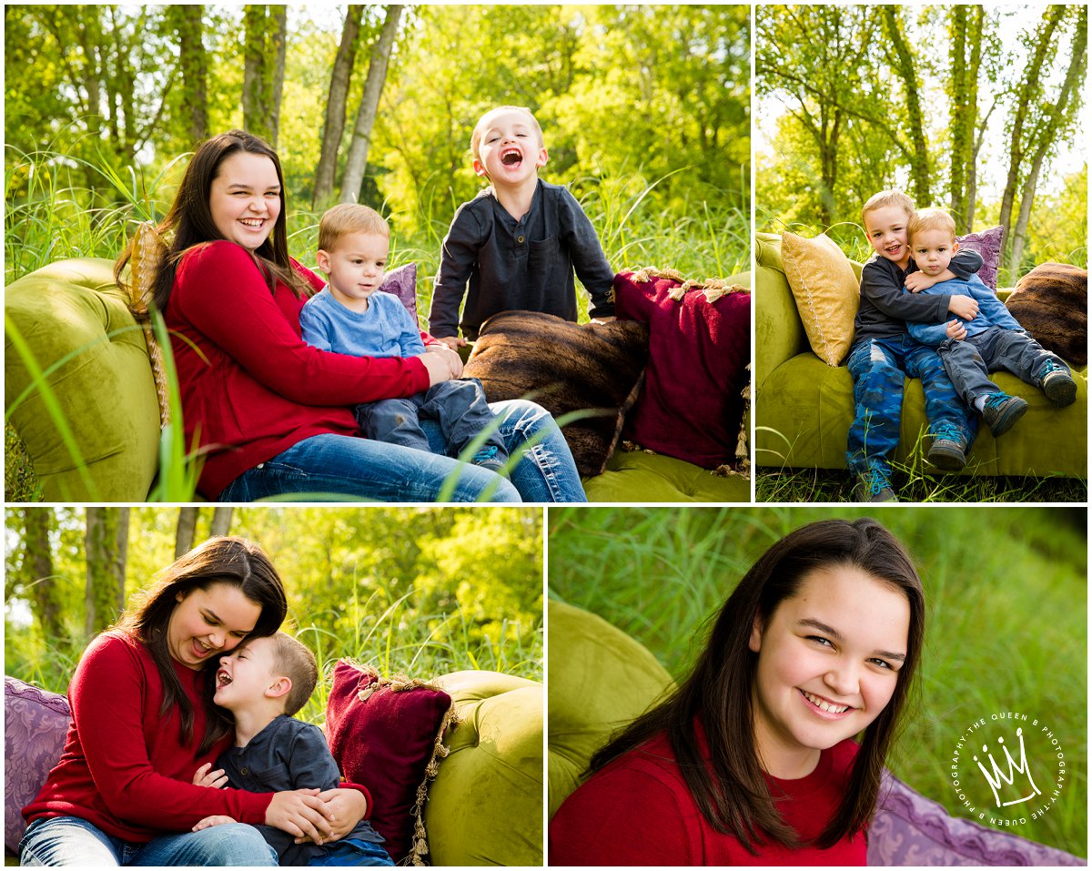 fun siblings on green couch in the woods