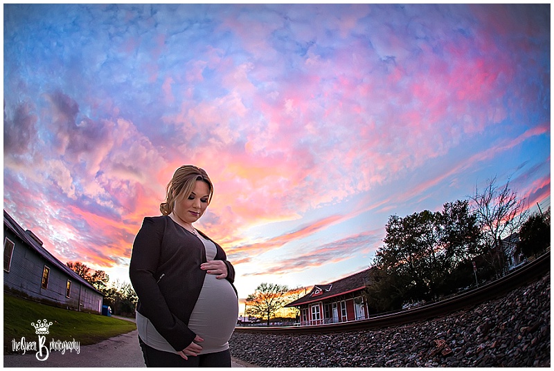 unique maternity portrait with stunning sunset sky
