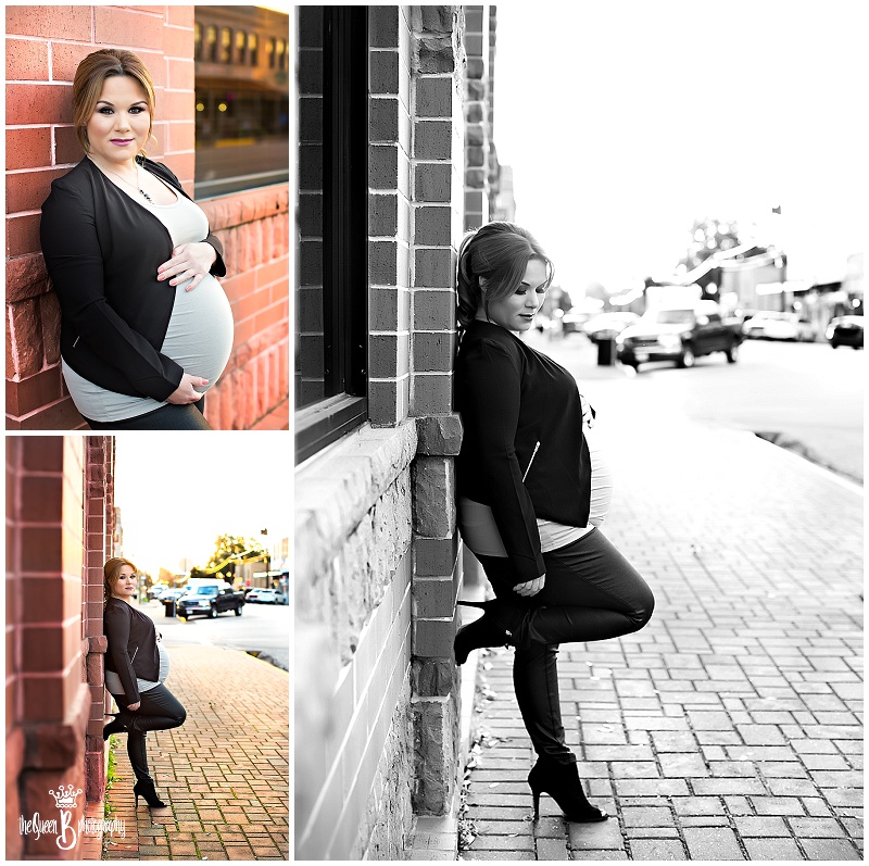 expectant mother posed against urban brick wall