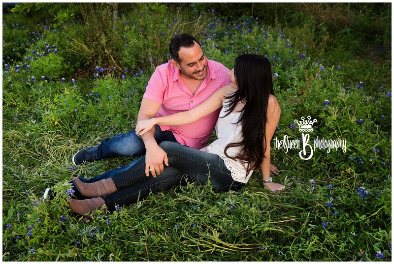 loving couple in Houston bluebonnets for anniversary session