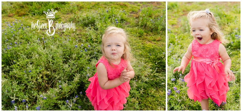 toddler girl in coral dress playing in Houston bluebonnets