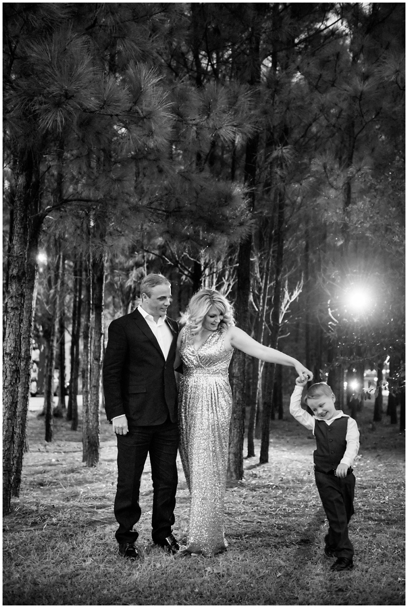 Formal family portrait outdoors black tie dancing little boy
