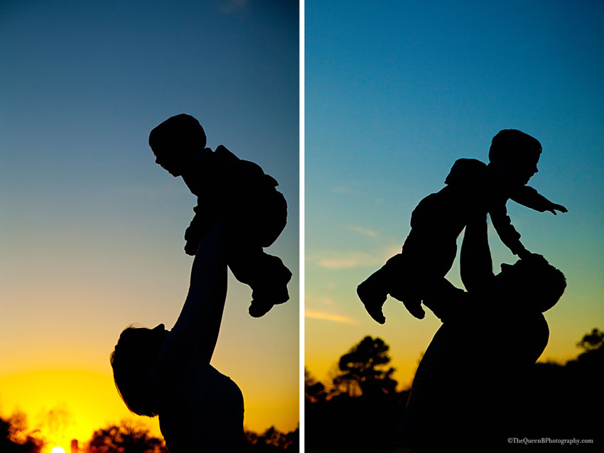 Mom and dad tossing little boy into sunset sky