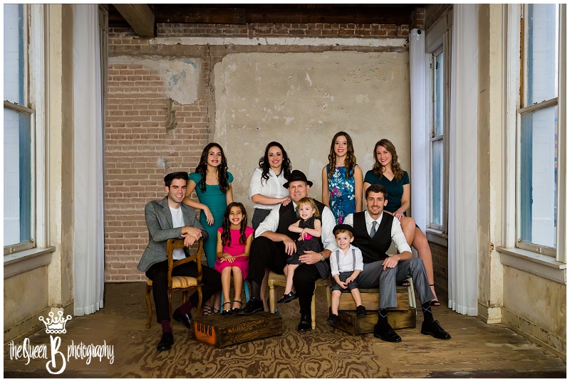 family of ten vintage styled in old warehouse