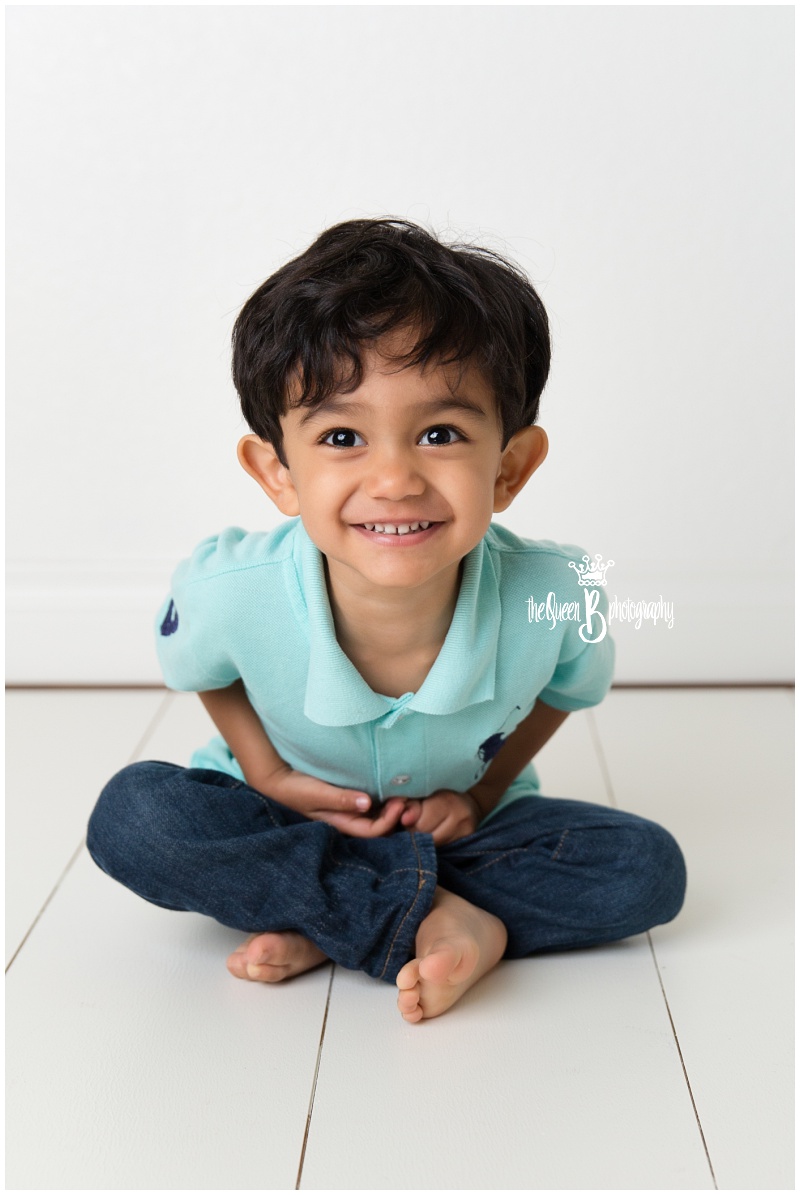 expressive toddler boy in Houston baby photographer studio