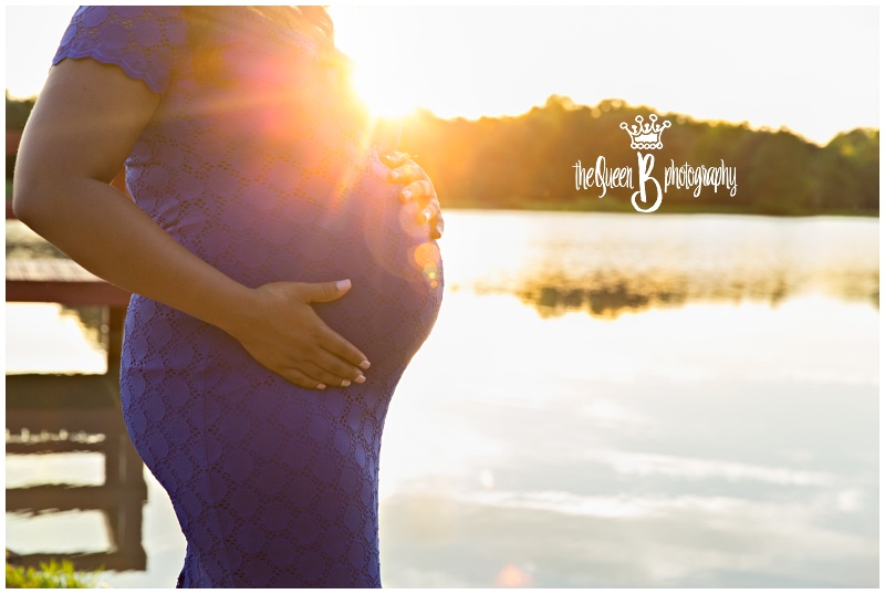 stunning sun filled maternity portrait by the lake
