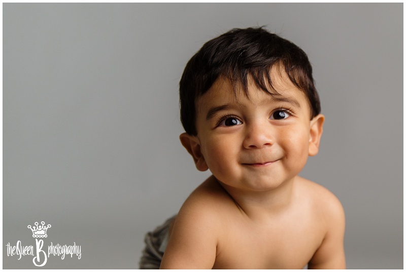 1st Birthday Photo Shoot of baby boy with huge brown eyes