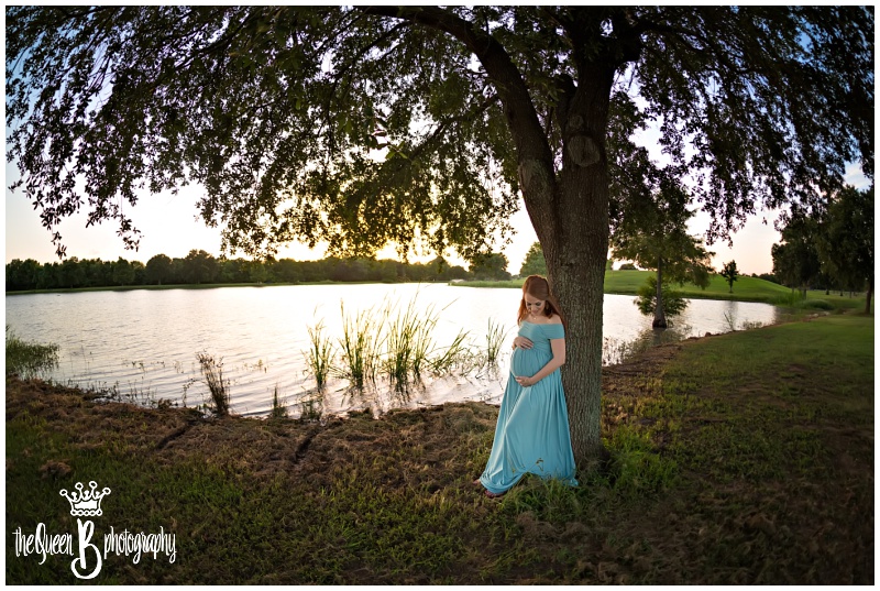 Sunset Maternity Portraits by the lake in beautiful Blue Maternity Gown